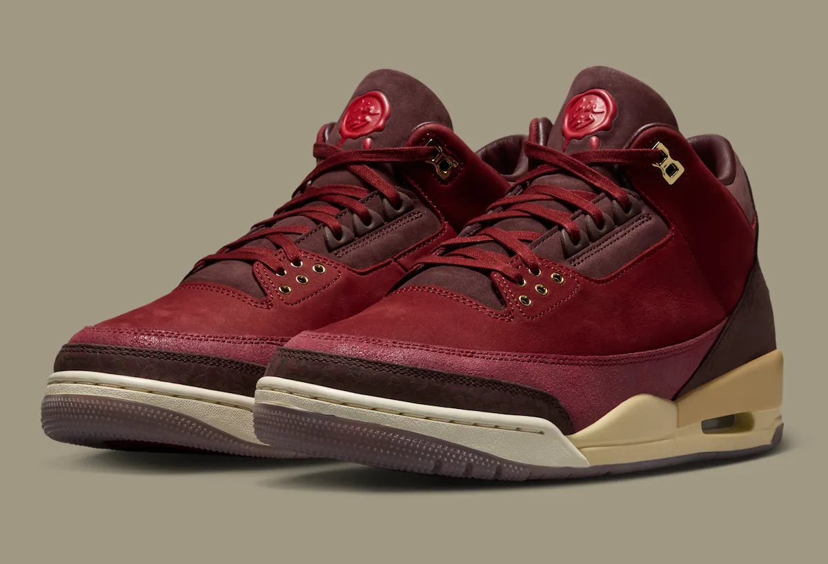 Vista detallada del Air Jordan 3 BIN 23 con sello de cera rojo y eyelets dorados